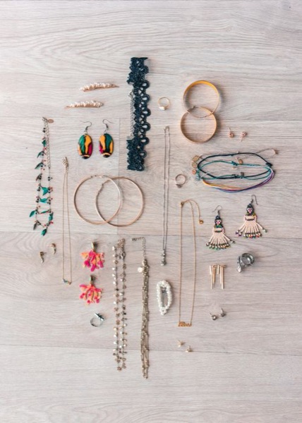 Flat lay of necklaces, earrings and bangles